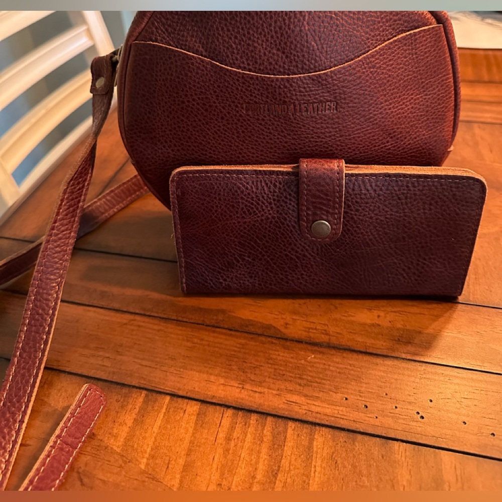Portland Leather Circle Crossbody with matching bifold wallet.